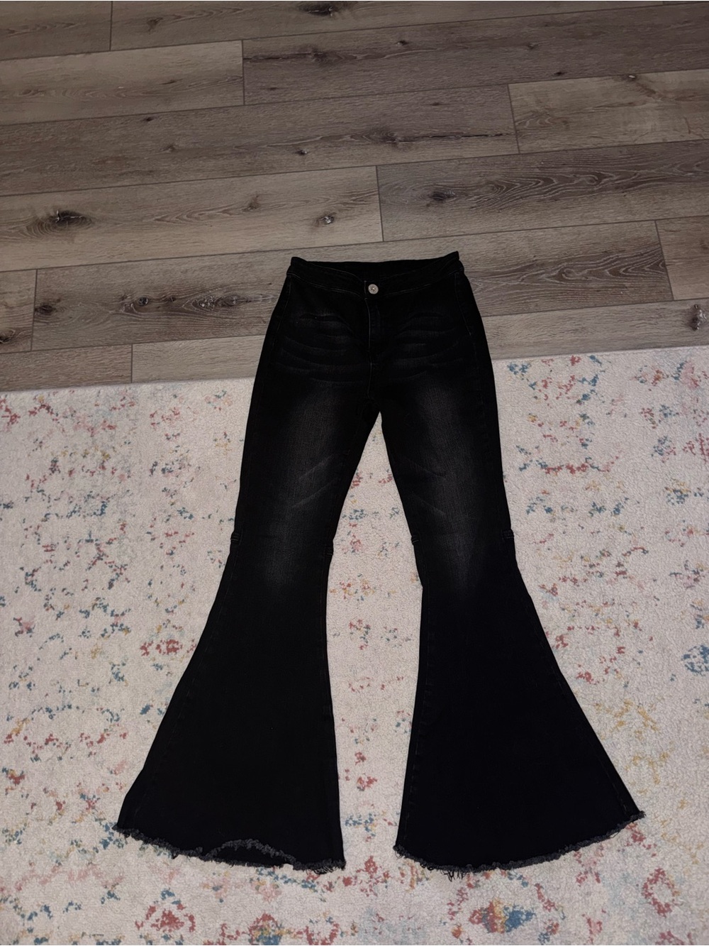 Black Flared Denim Jeans with Raw Hem